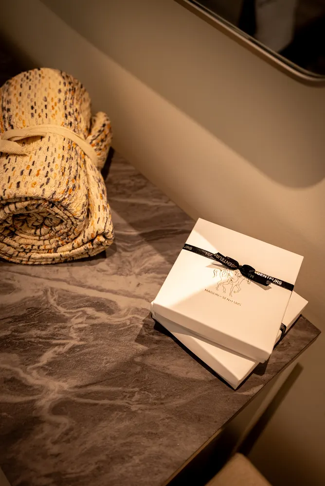 Linens and treatment products prepared before a session at Maison Kalléa